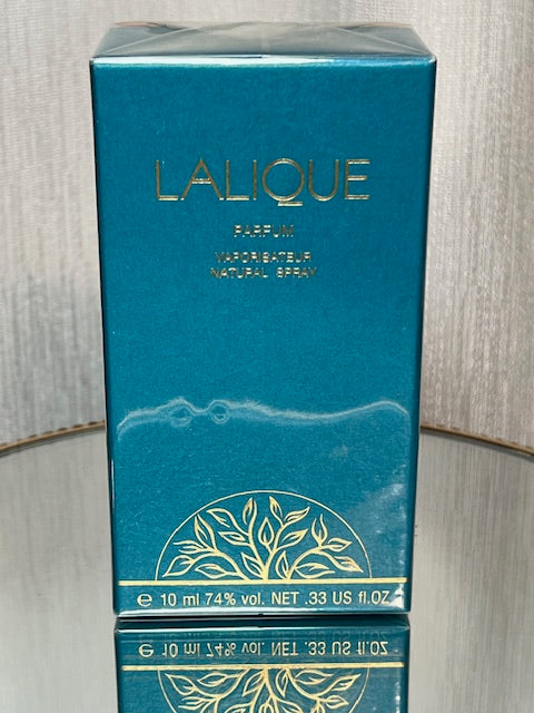 Lalique Lalique extrait 10 ml vintage gold case. Sealed