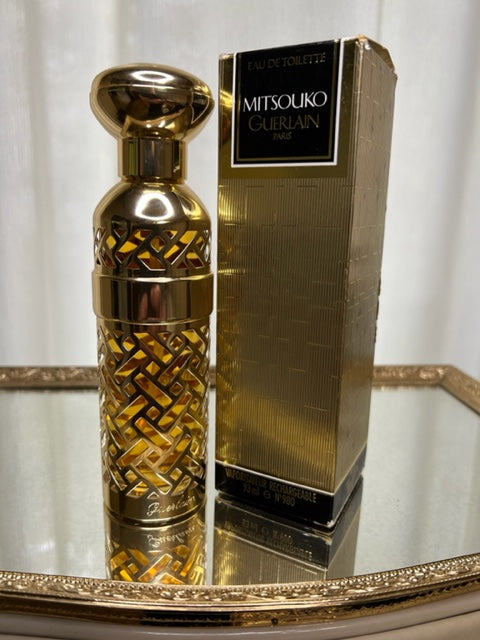 Mitsouko Guerlain edt 93 ml. Vintage, gold case. Sealed bottle